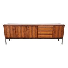 a large wooden sideboard with three drawers