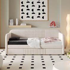 a modern daybed with black and white decor