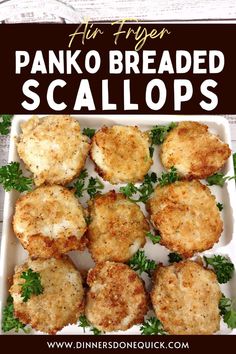 panko breaded scallops on a plate with parsley in the middle