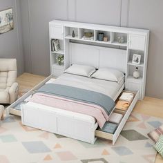 a bed with drawers underneath it in a room