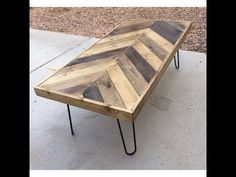 a table made out of wood with hairpin legs