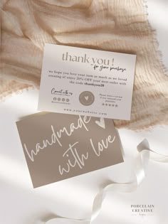 a thank card with the words handmade with love written on it next to a blanket