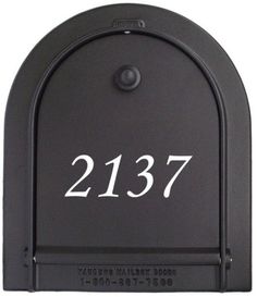 a black mailbox with the number twenty seven on it's front and bottom