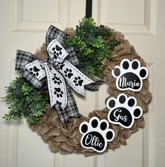 a wreath with paw prints on it