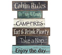 a wooden sign that says campers eat & drink plenty take a nap enjoy the day