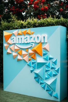 an amazon sign is shown in front of some bushes