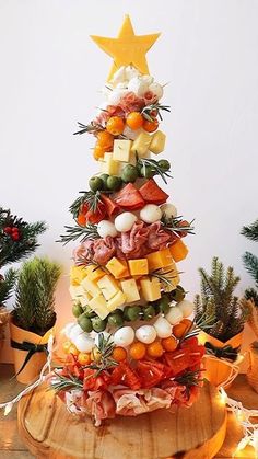 a christmas tree made out of cheese and meats