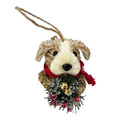 a dog ornament hanging from a rope with christmas decorations on it's neck