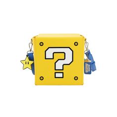 a small yellow bag with a question mark on the front and star charms attached to it