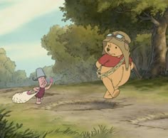 winnie the pooh and piglet running in the woods