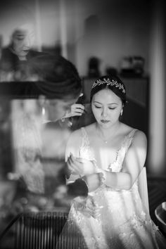 the bride is getting ready for her wedding