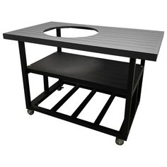 a black and white photo of a table on wheels