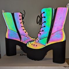 These Are New Ocho Toros Platform Boots With An Inside Zip, Decorative Spikes, A Chunky Heel, And Made Of A Reflective Material That Lights Up In Amazing Rainbow Colors When Hit With A Flash. Size 6 But A Decently Generous 6, I Normally Wear 6.5 And These Were Comfortable. These Also Have A Generous Shaft Size, And Rise ~7.5" Up The Leg. Under Most Lighting Conditions, These Boots Look Grey Or A Greenish-Pinkish-Grey, They Only Display This Rainbow Color With A Flash. These Have Been Tried On In Trendy High Ankle Pink Heels, Multicolor Round Toe Platform Boots For Party, Multicolor Synthetic Boots For Party, Pink Synthetic Boots For Summer, Pink Platform Boots For Summer, Casual Pink High Heel Platform Boots, Trendy Multicolor Closed Toe Boots, Pink Synthetic Summer Boots, Edgy Pink Boots For Spring