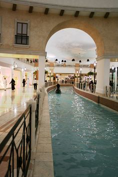 an indoor swimming pool in a shopping mall