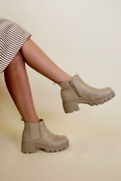 Add a youthful vibe to your look with these playful Camden booties. The distressed toe and heel detail add character to your style while the stretch side panels provide a flexible fit. The easy on/off side zipper and lightly padded footbed ensure comfort. Standing tall on a chunky 1 1/2 inch heel with a 1/2 inch platform, these booties are perfect for any occasion. Beige Lace-up Casual Booties, Brown Lace-up Booties With Rubber Sole, Casual Brown Non-slip Booties, Cute Brown Non-slip Booties, Medium Width Booties With 4-inch Heel, 2 Inch Heels, Stand Tall, Side Panels, On Off