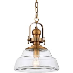 The glass shade is transparent to allow the interior of this industrial pendant light to be visible. An antique brass finish beautifully accentuates its intricate details throughout. Use the addition of this charming fixture to leave a bold impression on your favorite living space. Antique Brass Pendant Light, Clear Glass Pendant Light, Pendant Light Styles, Kitchen Light, Brass Pendant Light, Antique Kitchen, Industrial Pendant Lights, House Decorating, Mini Chandelier