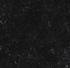 a black marble textured background or wallpaper