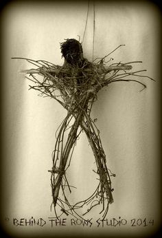 a black and white photo of a bird's nest with the words behind it