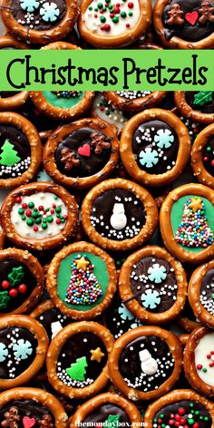 christmas pretzels with chocolate frosting and sprinkles are displayed on a table