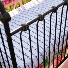 a baby crib with a sheet on top of it's rails and the words happy mother written in black ink