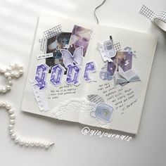 an open book with some pictures and beads on the cover, next to a bead necklace