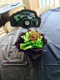 a monster truck centerpiece sitting on top of a table