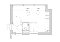 the floor plan for an office with two desks and one chair, including a toilet