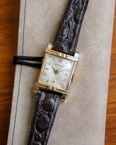 Wittnauer (Longines) Vintage Art Deco Tank Watch (1950s) * A stylish art deco men's watch that can also be considered unisex * Production year: the 1950s * Case: Gold-filled case with a stainless steel case back * Stylistc fancy lugs and & a sub-second dial * Movement: Swiss-made manual movement working beautifully * Diameter: ca. 38x26mm (incl. lugs and crown) * Condition: Very good, given its age & some patina on the corners of the dial * Strap: High-quality genuine leather strap with a vintag Retro Rectangular Watches For Formal Occasions, Retro Rectangular Formal Watches, Vintage Rectangular Watch Accessories With Diamond Hour Markers, Vintage Watch Accessories With Diamond Hour Markers As Gift, Vintage Rectangular Dial Watch Accessories, Art Deco Rectangular Quartz Watch, Retro Watches With Rectangular Dial For Anniversary, Retro Watch With Rectangular Dial For Anniversary, Vintage Rectangular Analog Watch Accessories