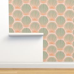 an image of a wallpaper design with seashells in pastel green and peach