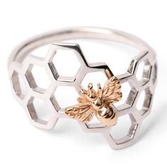 PRICES MAY VARY. Adorable Bee Design: This 925 Sterling Silver Honeycomb with Bronze Bee Ring is perfect for those who love the outdoors, gardening, & yoga, offering a charming & symbolic touch to your jewelry collection. Versatile Everyday Accessory: The delicate beauty of this Bee Ring is perfect for celebrating warm Summer days, Summer Weddings & even Graduation as the bee is a symbol of new life, strength & wisdom. Eco-Friendly Recyled Silver Ring: Made from 100% recycled sterling silver, th Honeycomb Ring, Silver Rings For Women, Bee Ring, Environmental Sustainability, Thick Ring, Delicate Beauty, Summer Weddings, Bee Design, Everyday Accessories