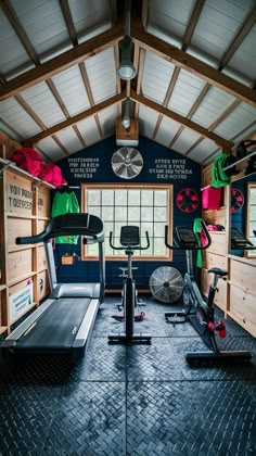 an indoor gym with treadmills and exercise equipment