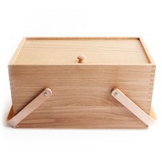 a wooden box with two handles on it