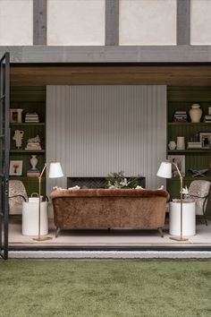 a living room filled with lots of furniture and decor