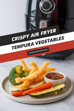 crispy air fryer tempura vegetables on a plate next to an air fryer