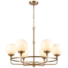 a brass chandelier with five white glass balls hanging from the center and four arms