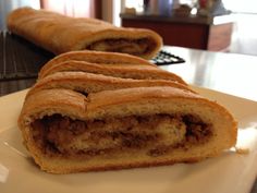 two pieces of bread sitting on top of a white plate