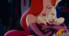 the little mermaid is hugging her pet rabbit in this scene from disney's the little mermaid