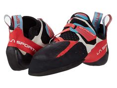 a pair of black and red climbing shoes