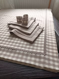 four placemats and napkins on top of a table