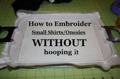 a sign that says how to embroider small shirts / onesies without hooping it