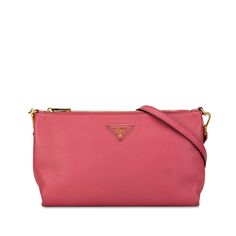 Product Details: Pink Prada Vitello Daino Crossbody Bag. This crossbody bag features a leather body, a detachable flat leather strap, a top zip closure, and an interior zip pocket. 6.7" L x 10.6" W x 1.6" D. Condition: Pre-owned. Good. Exterior Front Scratched. Exterior Front stained with Other. Exterior Back Scratched. Exterior Back stained with Other. Exterior Bottom stained with Other. Exterior Handle Creased, Worn. Exterior Handle stained with Other. Exterior Corners Worn. Exterior Top Cracked, Worn. Item has an odor of Other. Embellishment Scratched. Practical Attachment Scratched. Zipper Scratched. Please note this is a pre-owned item that may display signs of wear consistent with the condition listed above and shown in photos. Designer Revival guarantees this is an authentic Pink Pr Prada Crossbody Bag, Boston Bag, 6 D, Birkin Bag, Body Bag, Chanel Classic Flap, Ysl Bag