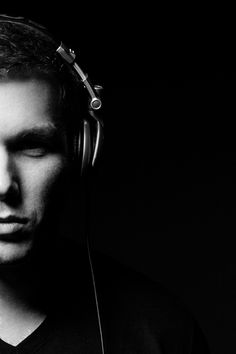 a man with headphones on his ears