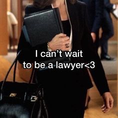 a woman in a suit carrying a black purse with the words i can't wait to be a lawyer?