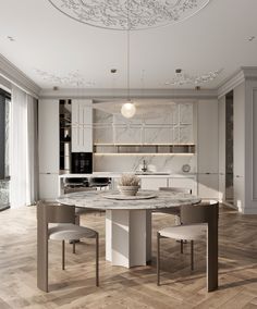 an elegant kitchen with marble counter tops and white cabinets, along with wooden flooring