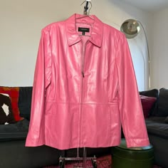 Vintage 1990's pink leather jacket.  Super sleek, simple design.  Size large. Fits as an oversized small nicely.  A few scuffs and marks but overall good vintage condition. Fitted Pink Leather Jacket For Spring, Pink Leather Jacket For Fall, Pink Fitted Leather Jacket For Spring, Casual Pink Leather Jacket With Long Sleeves, Pink Womens Retro Jacket, Fitted Retro Pink Outerwear, Spring Long Sleeve Pink Leather Jacket, Pink Leather Winter Outerwear, Light Pink Leather Jacket