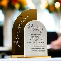 a wedding guest book is on display in the reception room at a hotel or conference center