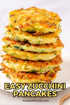 easy zucchini pancakes stacked on top of each other with the title overlay