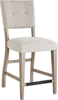 an upholstered dining chair with buttons on the back and seat, made from wood