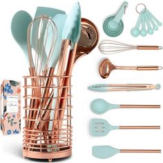 the kitchen utensils are in a copper holder