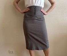 Women's Skirt Vintage Skirt Pencil Skirt Gray Striped Cotton Skirt Midi Length High Waist Shown on model S/M Measurements ( lying flat): Length: 28.5"/ 72.5 cm Waist: 15"/ 38 cm Hips: 18 3/4"/ 47.5 cm Condition: Great Vintage Condition Material: 100%cotton N.B. Color may slightly differ from picture Please check measurements to insure a proper fit. Remember to allow yourself some extra room for movement. You can compare these with something from your closet that fits you well. Please convo me if High-waisted Fitted Lined Skirt, High Waist Fitted Lined Skirt, Retro Fitted Skirt With Pockets, Fitted Vintage Mini Skirt With Pockets, Retro Fitted Mini Skirt With Pockets, Retro High Waist Relaxed Skirt, Retro Fitted Midi Skirt, Fitted Knee-length Vintage Mini Skirt, Vintage Fitted Knee-length Mini Skirt